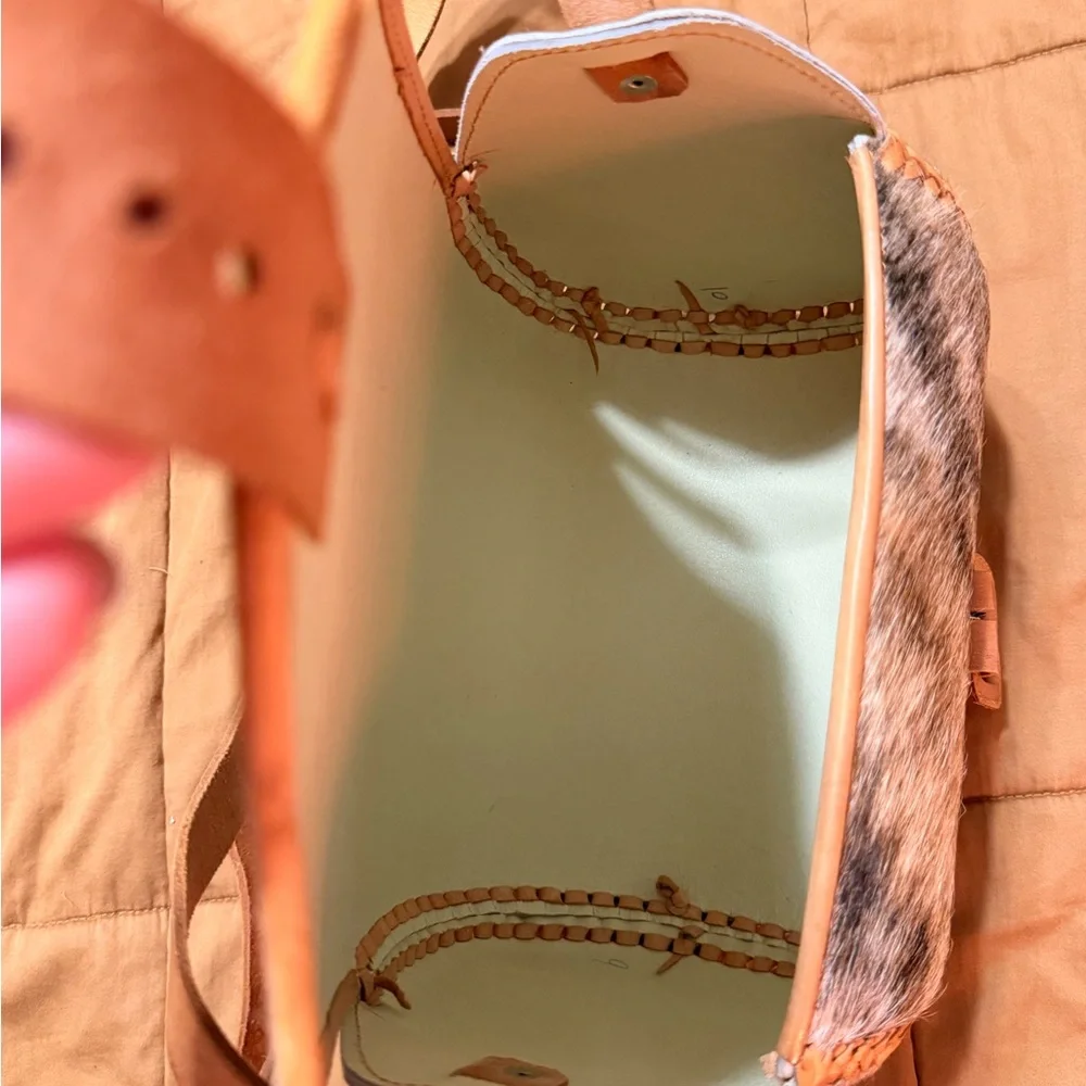 Leather and Cowhide Crossbody Bucket Bag in Tan